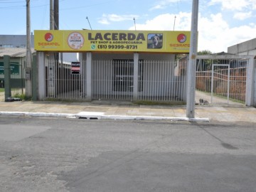 FACHADA DA SALA COMERCIAL E ENTRADA DE CARROS LATERAL